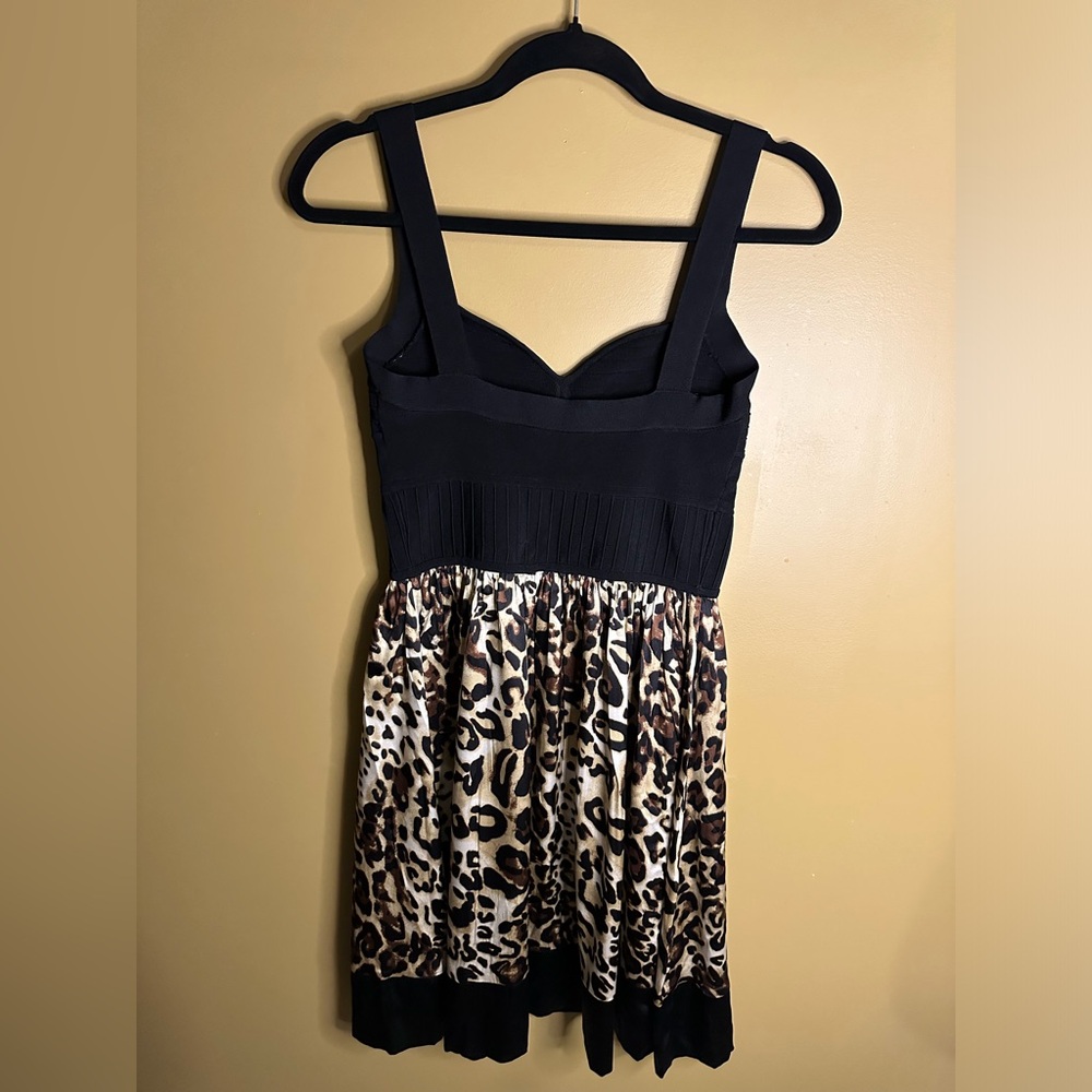 BEBE Women’s Dress beige animal print/black. Size M. Good Used Condition.